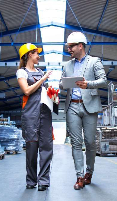 manager-supervisor-industrial-worker-uniform-walking-large-metal-factory-hall-talking-about-incr